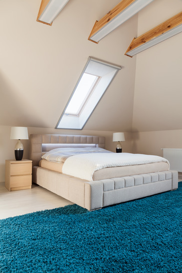 Bedroom arranged in the attic