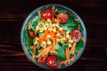 mixed vegetable salad in a mason jar. 